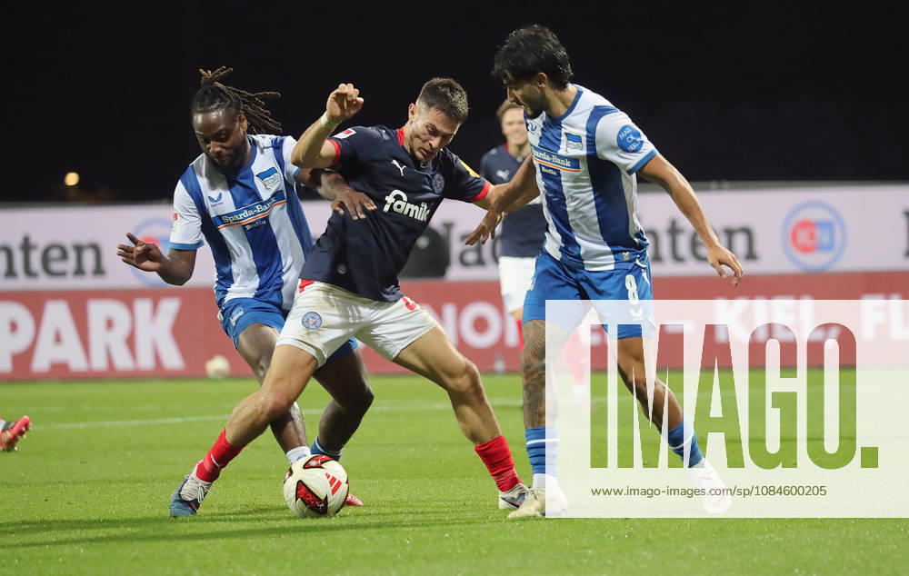Deyovaisio Zeefuik, Hertha BSC Berlin; Adrian Kapralik, Holstein Kiel; Kevin Sessa, Hertha BSC Berlin; Soccer, Men s, 2026–2027 Season, 2. Bundesliga, Holstein Stadium, Holstein Kiel vs. Hertha BSC Berlin DFL REGULATIONS PROHIBIT ANY USE OF PHOTOGRAPHS AS IMAGE SEQUENCES AND OR QUASI-VIDEO