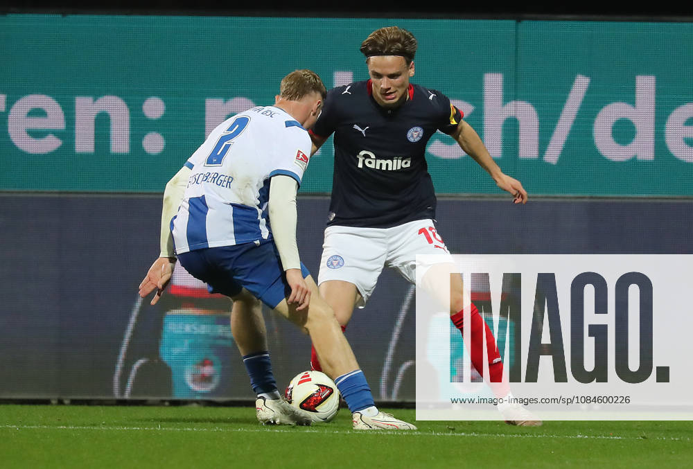 Julian Eitschberger, Hertha BSC Berlin; Jonas Therkelsen, Holstein Kiel; Soccer, Men s, 2026–2027 Season, 2. Bundesliga, Holstein Stadium, Holstein Kiel vs. Hertha BSC Berlin. DFL regulations prohibit any use of photographs as image sequences and or quasi-video.