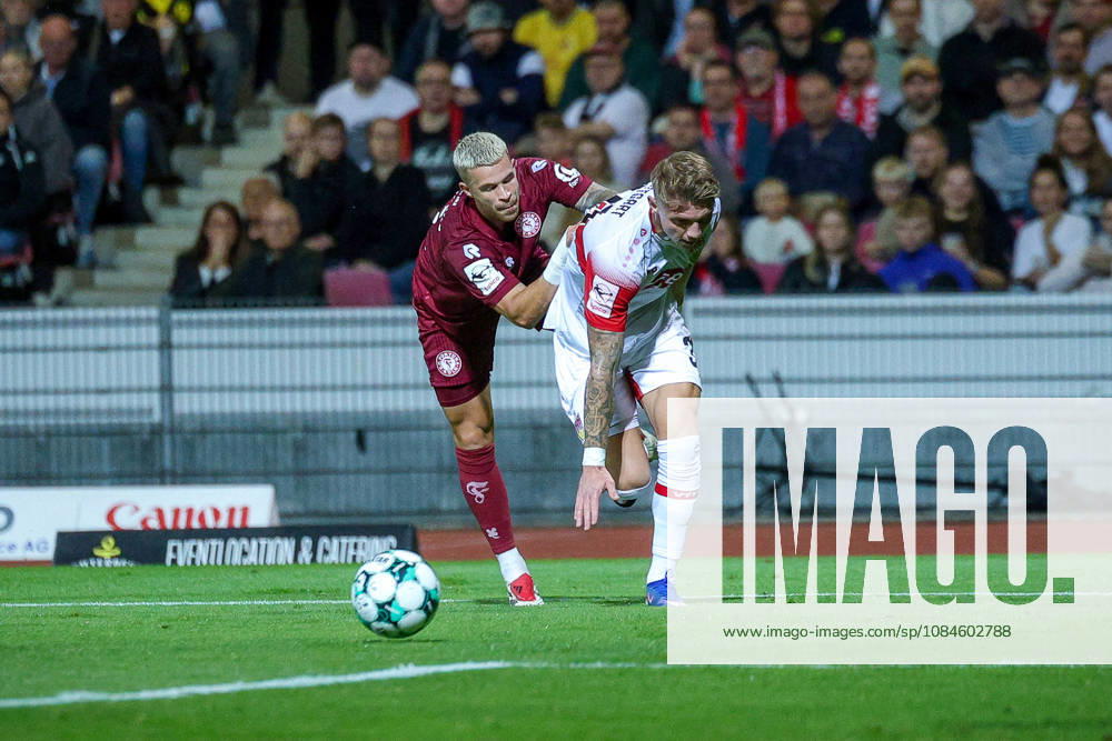Soccer, SC Fortuna Köln vs. VfB Stuttgart II, 3rd Division, South Division, Matchday 10, 2026–2027 Season: Nico Thier of Fortuna Köln 07 in a tackle against Veit Stange of VfB Stuttgart II. 31. DFB regulations prohibit any use of photographs as image sequences and or quasi-video. North Rhine-Westphalia, Germany