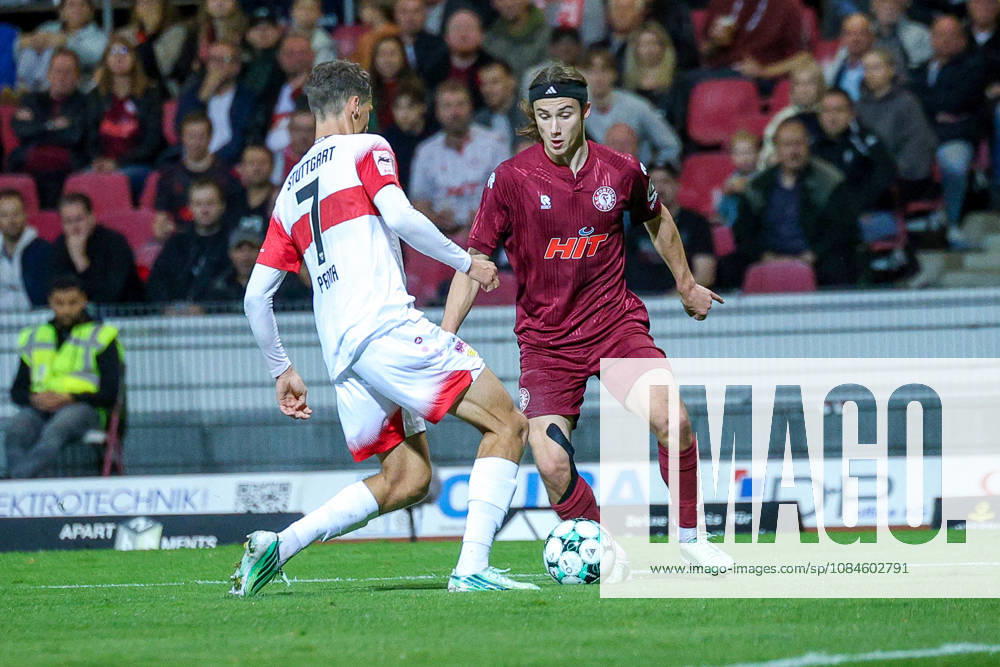 Soccer, SC Fortuna Köln vs. VfB Stuttgart II, 3rd Division, South Division, Matchday 10, 2026–2027 Season: Bennit Bröger (Fortuna Cologne) No. 38 in a tackle with Lauri Penna (VfB Stuttgart II) No. 07. DFB regulations prohibit any use of photographs as image sequences and or quasi-video. North Rhine-Westphalia, Germany