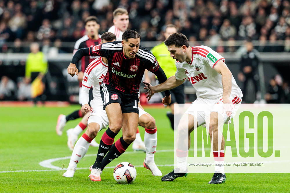 Younes Ebnoutalib (Eintracht Frankfurt, 11) controls the ball against Luka Lochoshvili (1. FC Koeln, 24) during the Bundesliga match between Eintracht Frankfurt vs. 1. FC Koeln at Deutsche Bank Park on matchday 6 of the 1. Bundesliga on October 16, 2026 in Frankfurt, Germany. DFL REGULATIONS PROHIBIT ANY USE OF PHOTOGRAPHS AS IMAGE SEQUENCES AND OR QUASI-VIDEO. Hesse Germany