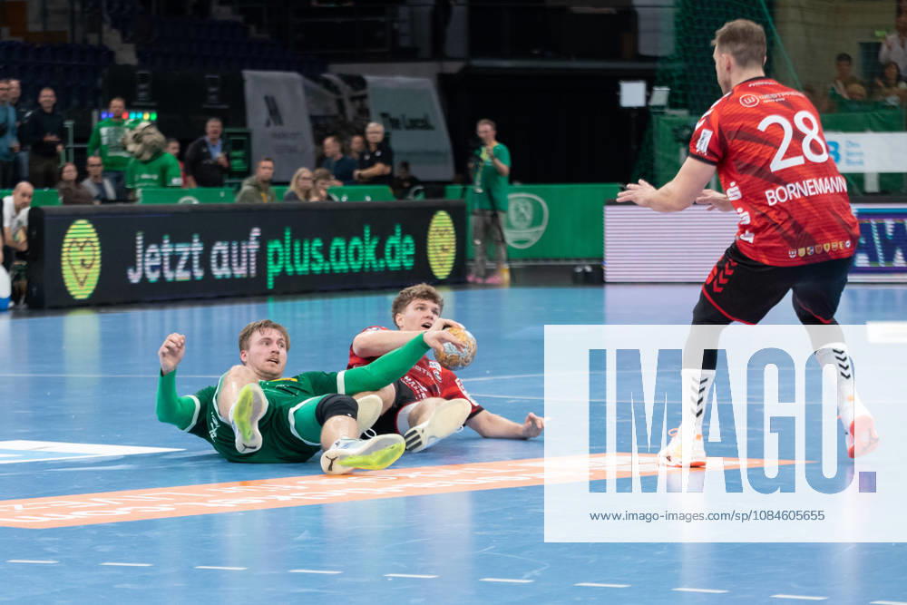 Handball, HBL2 SC DHfK Leipzig vs. ASV Hamm Westfalen, October 16, 2026; Franz Semper 32, SC DHfK Leipzig, and Adam Horvath Garaba 5, ASV Hamm Westfalen both on the floor Handball, 2nd Bundesliga, 2026–2027 season, Matchday 8: SC DHfK Leipzig vs. ASV Hamm Westfalen on October 16, 2026, at the Quarterback Immobilien Arena Leipzig