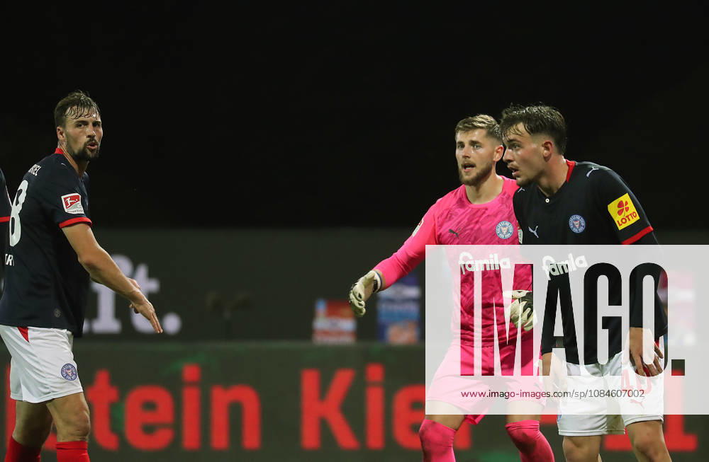 Jonas Meffert, Holstein Kiel; Goalkeeper Timon Weiner, Holstein Kiel; Leon Parduzi, Holstein Kiel Soccer, Men s, 2026–2027 Season, 2. Bundesliga, Holstein Stadium, Holstein Kiel vs. Hertha BSC Berlin, 0–0. DFL regulations prohibit any use of photographs as image sequences and or quasi-video.