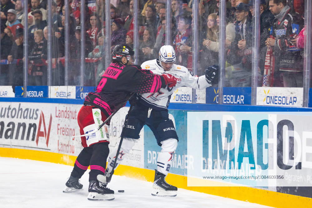 DEL2 Matchday 9 ice hockey game between EV Landshut and the Ravensburg Towerstars on October 16, 2026, at the VR Bank Landshut Arena in Landshut, Germany: Finn Serikow (EV Landshut, No. 8) and Matej Mrazek (Ravensburg Towerstars, No. 21) seen in action during the DEL2 Matchday 9 ice hockey game between EV Landshut and the Ravensburg Towerstars on October 16, 2026, at the VR Bank Landshut Arena in Landshut, Germany