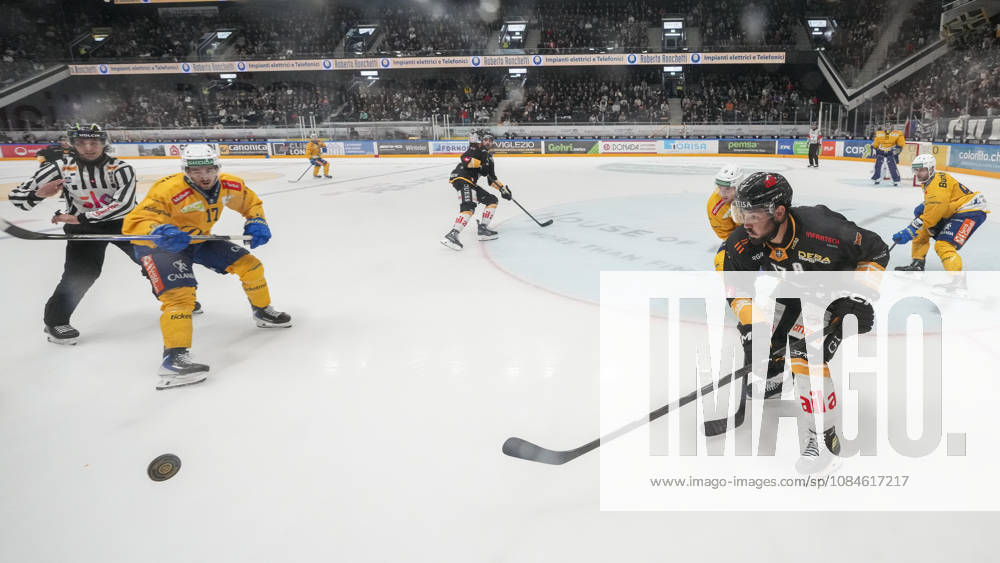 LUGANO, SWITZERLAND, OCTOBER 16: Luca Fazzini of Lugano (R) faces off against Ken Jager of Davos (L) during the game between HC Lugano and HC Davos at the Corner Arena on October 16, 2026, in Lugano, Switzerland (Lugano, Ticino, Switzerland)