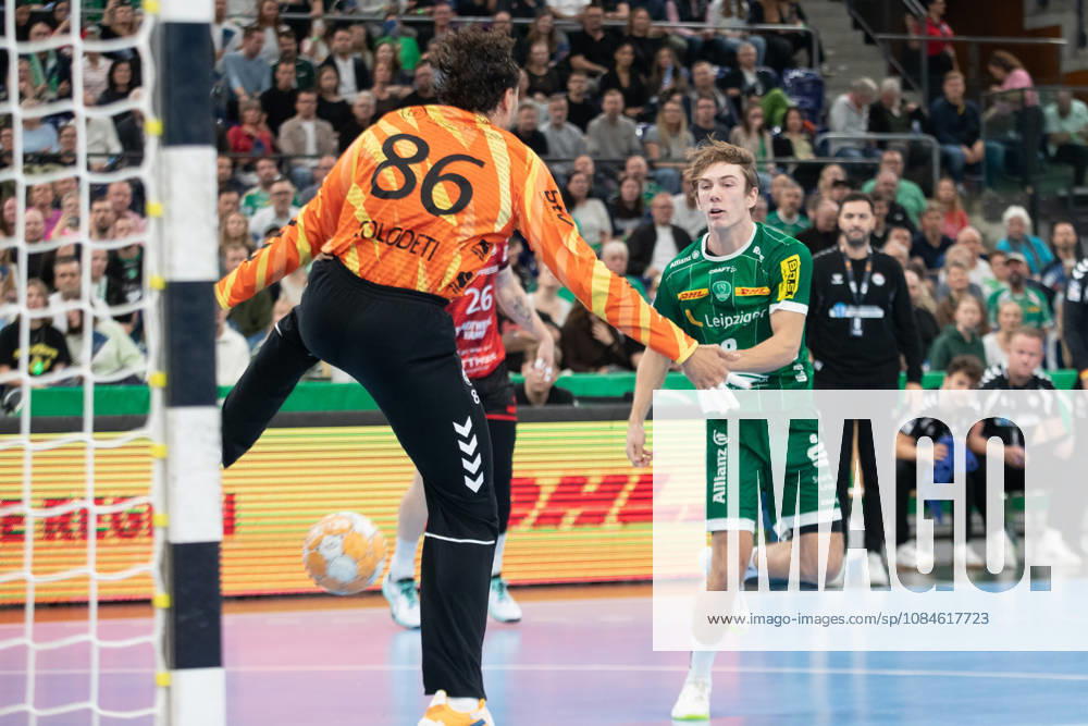 Handball, HBL2: SC DHfK Leipzig vs. ASV Hamm Westfalen, October 16, 2026. Staffan Peter (18), SC DHfK Leipzig, scores a goal past goalkeeper Marcos Vinicios Colodeti (86), ASV Hamm Westfalen Handball, 2nd Bundesliga, 2026–2027 season, Matchday 8: SC DHfK Leipzig vs. ASV Hamm Westfalen on October 16, 2026, at the Quarterback Immobilien Arena Leipzig