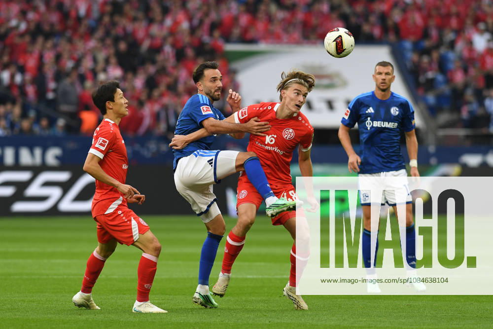 Kenan Karaman of FC Schalke 04 and Kacper Potulski of 1. FSV Mainz 05 in a tackle during the Bundesliga match between FC Schalke 04 and 1. FSV Mainz 05, Veltins Arena on October 17, 2026, in Gelsenkirchen, Germany. Photo by Ralf Treese, DeFodi Images. Kenan Karaman of FC Schalke 04 and Kacper Potulski of 1. FSV Mainz 05 battle for the ball during the Bundesliga match between FC Schalke 04 and 1. FSV Mainz 05 at Veltins Arena on October 17, 2026 in Gelsenkirchen, Germany. Photo by Ralf Treese, DeFodi Images. DFB and DFL regulations prohibit any use of photographs as image sequences and or quasi-video. Photo by Ralf Treese, DeFodi Images.