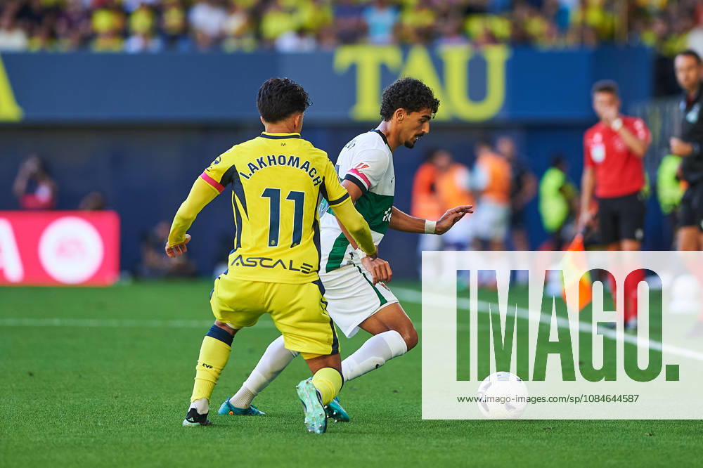 Ilias Akhomach of Villarreal CF and Roy Revivo of Elche CF during the LaLiga EA Sports match between Villarreal CF and Elche CF at Estadio de la Cerámica on October 17, 2026, in Villarreal, Spain