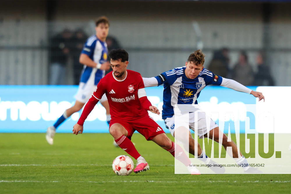 Soccer, Men s, Regionalliga Nord, Matchday 14, BSV Kickers Emden 1, FC Phönix Lübeck, Luc Ihorst (14) of BSV Kickers Emden battles for the ball with Fabio Oliviero Maiolo (8) of Phönix Lübeck