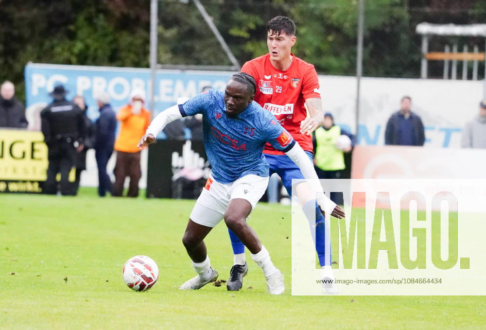 Cham, Switzerland; Men s Soccer, 2026–2027 Season, Swiss Cup, Round 2, SC Cham vs. FC Sion, 0–2; Photo: Josias Lukembila (FC Sion, back), Jorge Mario Buehler (FC Cham); Action: Tackle