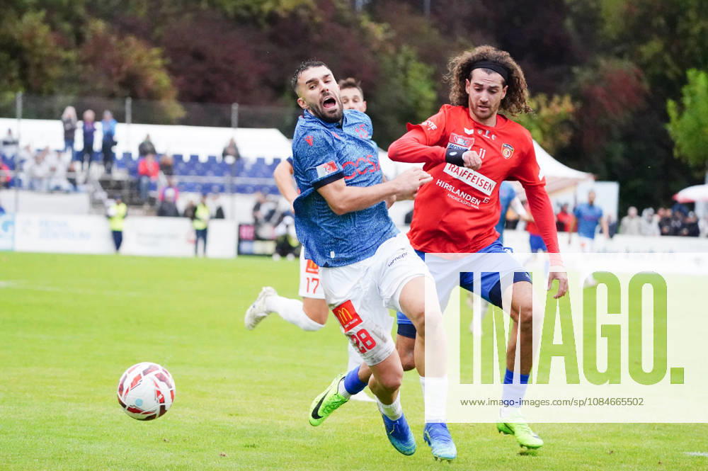 Cham, Switzerland; Men s Soccer, 2026–2027 Season, Swiss Cup, Round 2, SC Cham vs. FC Sion, 0–2; Photo: Hajrizi Kreshnik, FC Sion vs. Marin Wiskemann, SC Cham; Reaction to a tackle