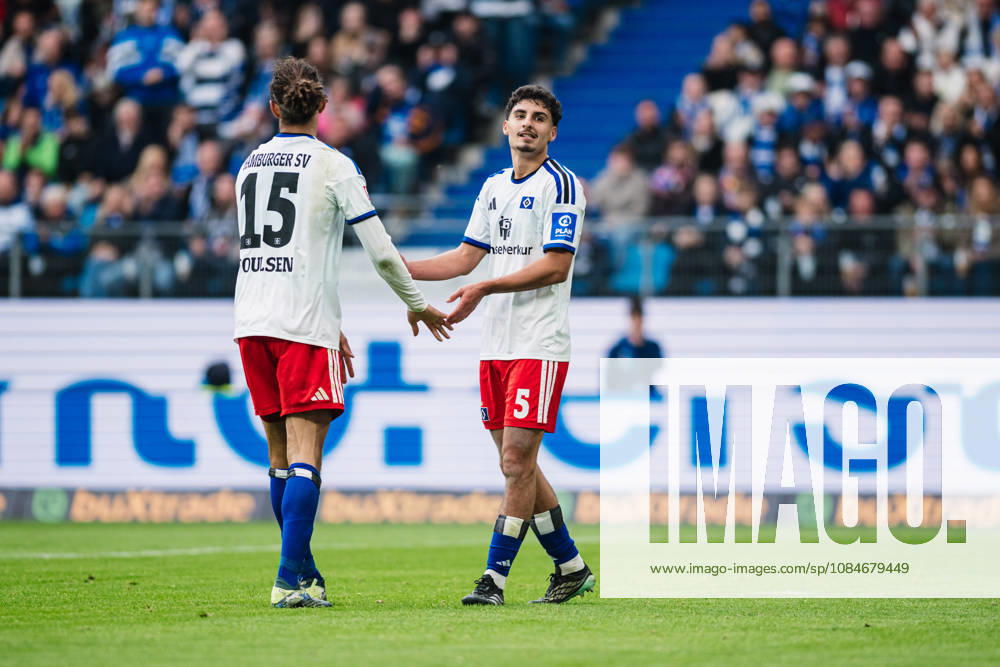 Bundesliga Match: Hamburger SV vs. VfB Stuttgart, October 17, 2026—Yussuf Poulsen (Hamburger SV, 15) and Martin Adeline (Hamburger SV, 5) high-five each other during the soccer match, 1st Bundesliga, Matchday 6: Hamburger SV vs. VfB Stuttgart on October 17, 2026, at the Volksparkstadion, Hamburg. DFL regulations prohibit any use of photographs as image sequences and or quasi-video.