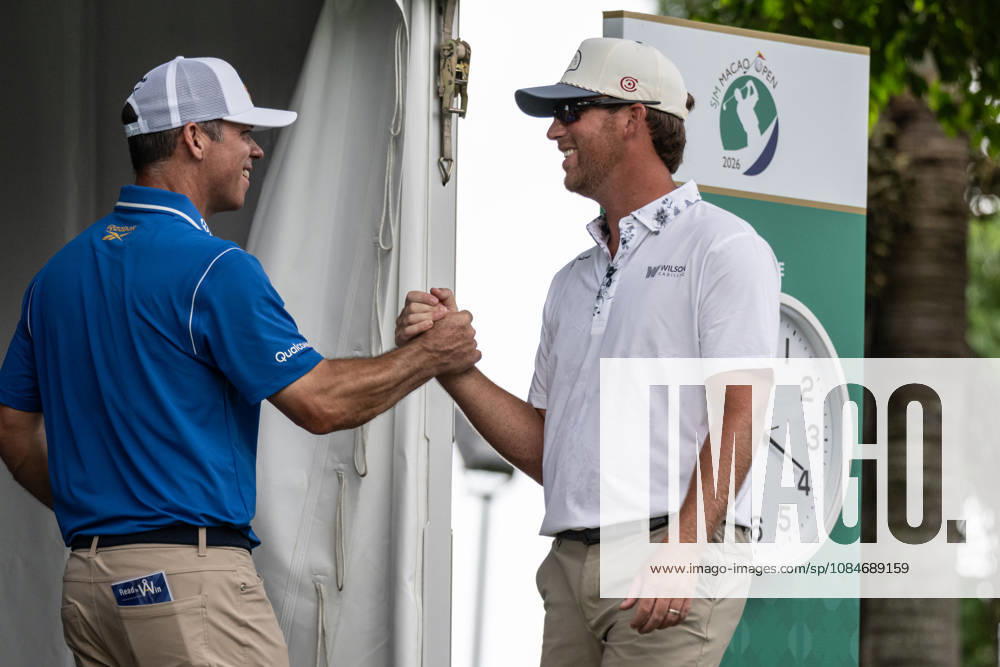 Paul CASEY from England greets USAâ€⠢s Andy OGLETREEâ€⠢ (R) Macau Open Golf 2026 Final Round. Macau Open Golf 2026 Final Round - ZUMAr144 20261018_zap_r144_009