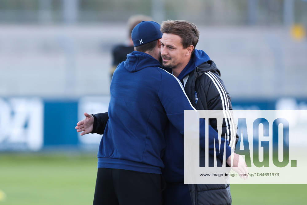 Soccer, Men s, Regionalliga Nord, Matchday 14, BSV Kickers Emden vs. 1 FC Phönix Lübeck; Coach Kevin Wölk of Phönix Lübeck hugs Coach Björn Lindemann of BSV Kickers Emden