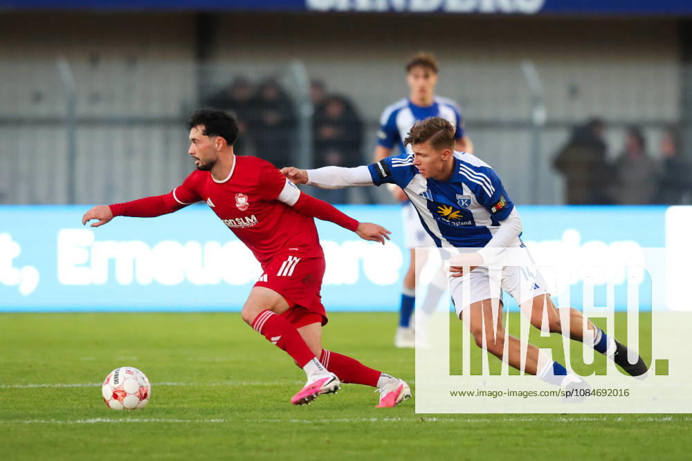 Soccer, Men s, Regionalliga Nord, Matchday 14, BSV Kickers Emden 1 FC Phönix Lübeck Luc Ihorst (14) of BSV Kickers Emden battles Fabio Oliviero Maiolo (8) of Phönix Lübeck