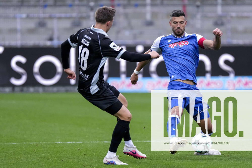 Fabian Wessig (Verl), 18, Diren Dagdeviren (TSG II), 8, tackle, game scene, duel, tackle, tackling, dynamic, action, 10 18 2026, Sinsheim, Germany, soccer, 3rd League, TSG 1899 Hoffenheim II vs. SC Verl, DFB and DFL regulations prohibit any use of photographs as image sequences and or quasi-video