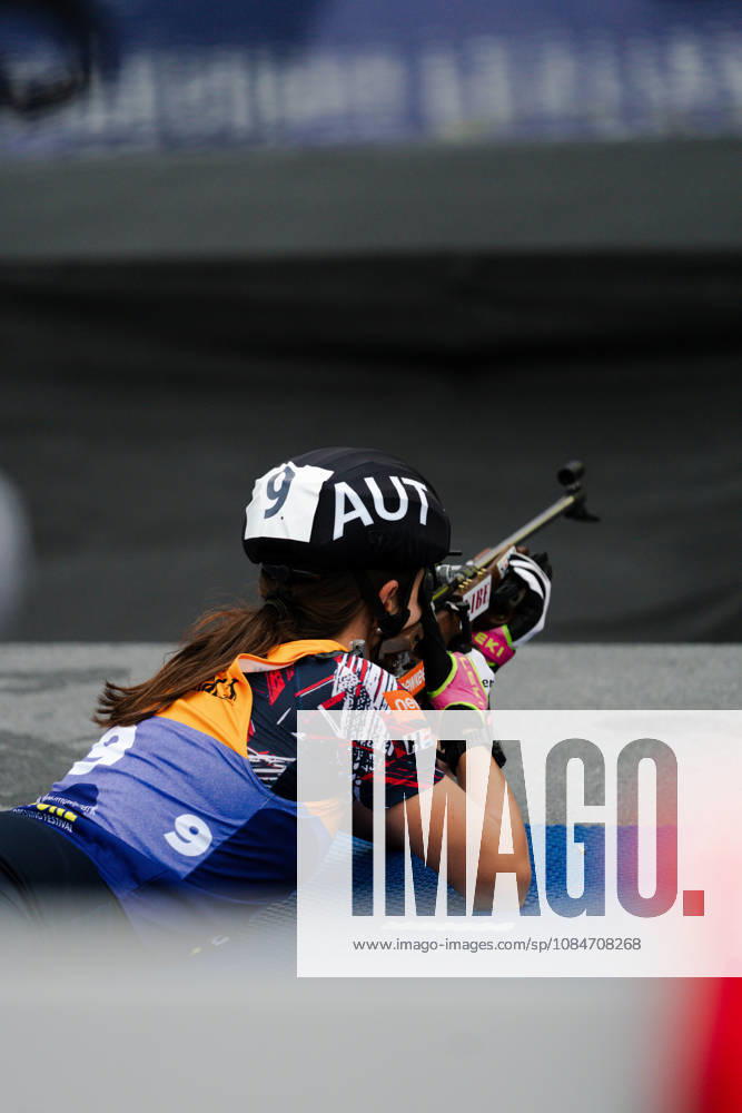GER, Biathlon, Women, IBU Biathlon Loop One Festival 2026, 2026–2027 Season, Women’s Super Sprint Qualification Heat 1–4: Anna Andexer (AUT), No. 9, lying down during warm-ups at the shooting range, Munich Olympic Park, Bavaria, Germany