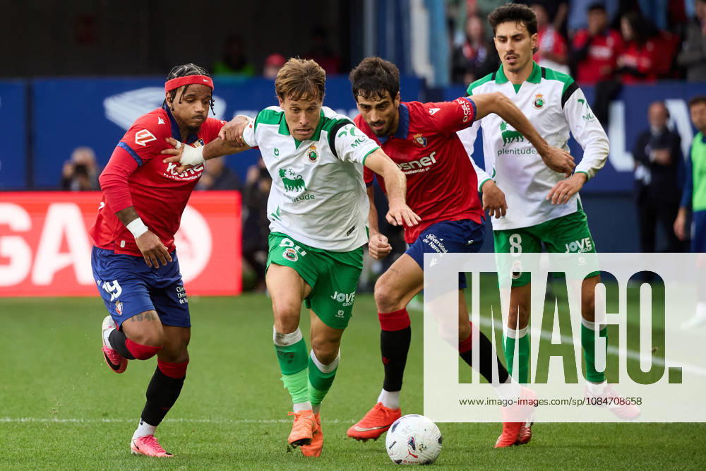 LaLiga EA Sports 2026-27 CA Osasuna vs. Racing de Santander Valentin Rosier 19 OSA L, Sergio Canales 20 RAC and Alejandro Catena 24 OSA R battle for the ball during the LaLiga EA Sports soccer match between CA Osasuna and Racing de Santander played at El Sadar Stadium in Pamplona, Spain, on Oct. 18, 2026. Andre Almeida 8 RAC is also visible in the image. Credit: Ínigo Alzugaray, Agencia LOF, Pamplona. LaLiga EA Sports 2026 27 CA Osasuna vs. Racing de Santander