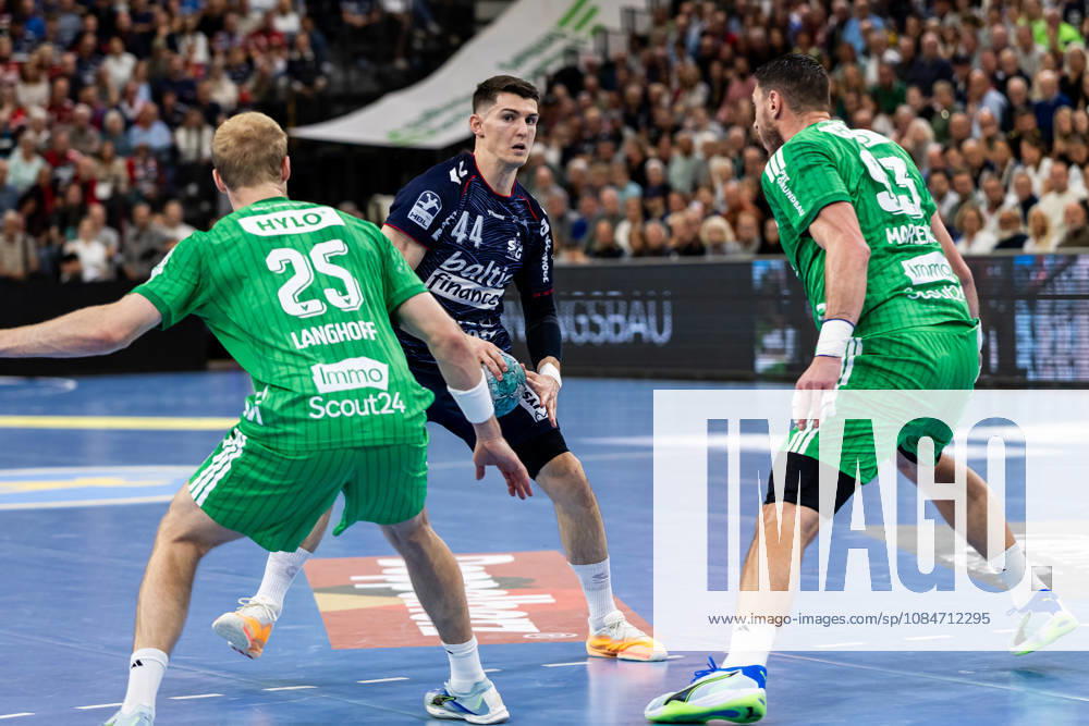 Opel HBL SG Flensburg Handewitt vs. Füchse Berlin 18 10 26 Aymeric Minne No. 44, SG Flensburg Handewitt vs. Matthes Langhoff No. 25, Füchse Berlin, and Mijajlo Marsenic No. 93, Füchse Berlin; Opel HBL SG Flensburg Handewitt vs. Füchse Berlin, GGW Arena on October 18, 2026