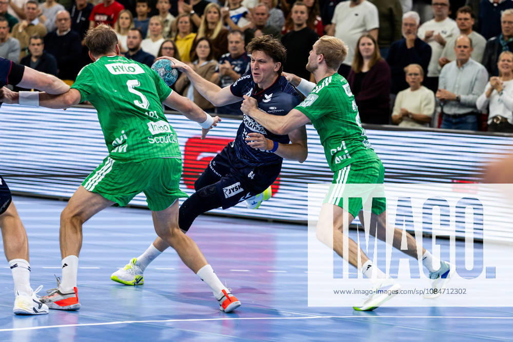 Opel HBL SG Flensburg Handewitt vs. Füchse Berlin, October 18, 2026—Lasse Kjaer Moller, No. 64, SG Flensburg Handewitt on the attack. Opel HBL SG Flensburg Handewitt vs. Füchse Berlin, GGW Arena