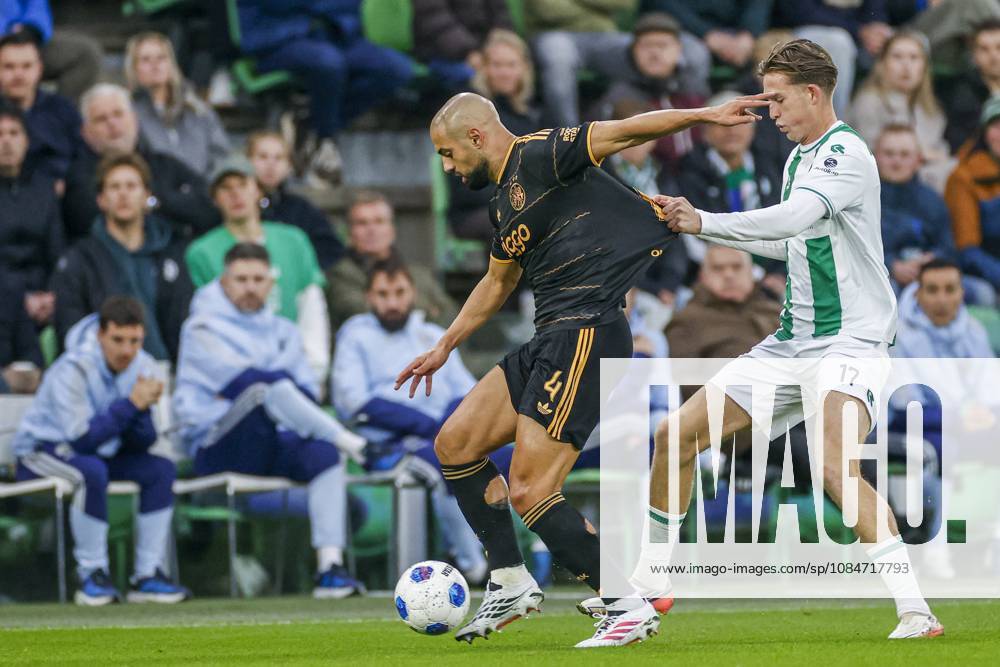 , Euroborg Stadium, season 2026 2027 , Dutch Eredivisie Football , match between FC Groningen and Ajax. Picture shows Ajax player Sofyan Amrabat and FC Groningen player David van der Werff Groningen - Ajax x208697658x