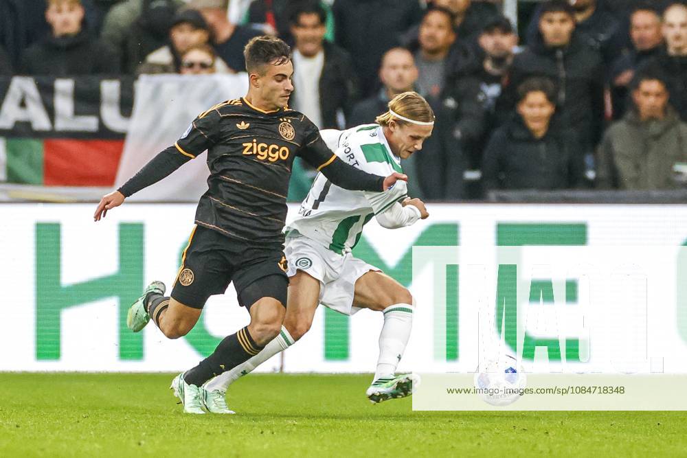, Euroborg Stadium, season 2026 2027 , Dutch Eredivisie Football , match between FC Groningen and Ajax. Picture shows Ajax player Lucas Rosa and FC Groningen player Jacob Ondrejka Groningen - Ajax x208698514x