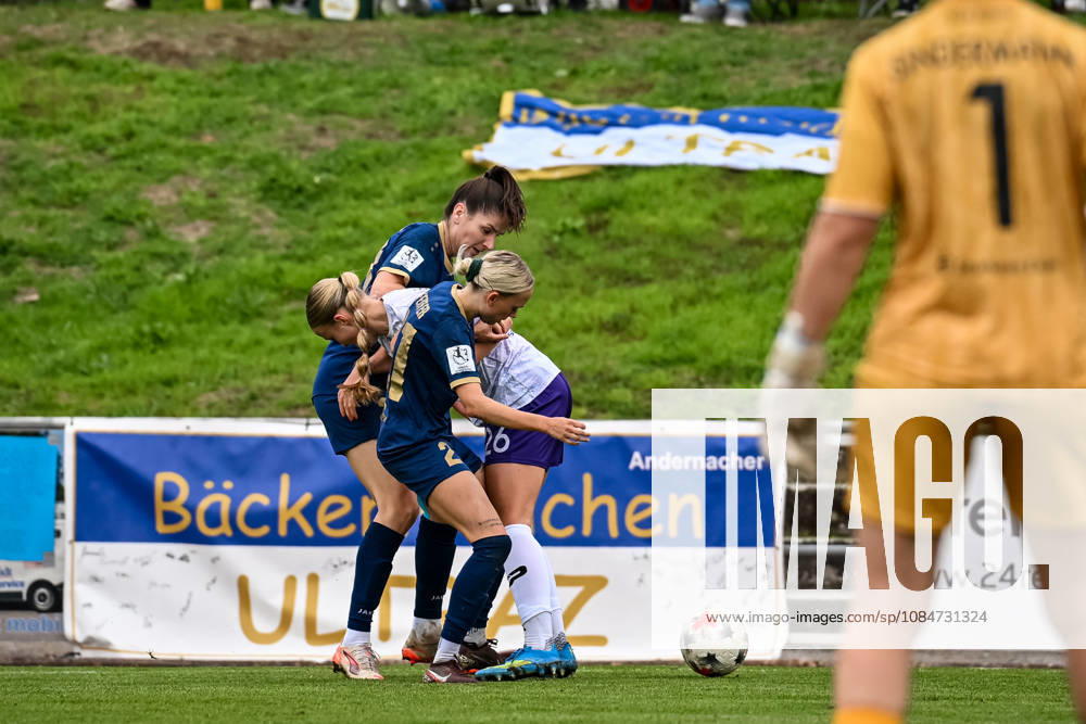 Soccer, Women s Bundesliga 2, 2026–2027, Matchday 9, SG 99 Andernach vs. SGS Essen: Isabel Pfeiffer (21, Andernach) and Magdalena Schumacher (23, Andernach) team up to try to take the ball away from Lany Mia Bäcker (26, Essen)
