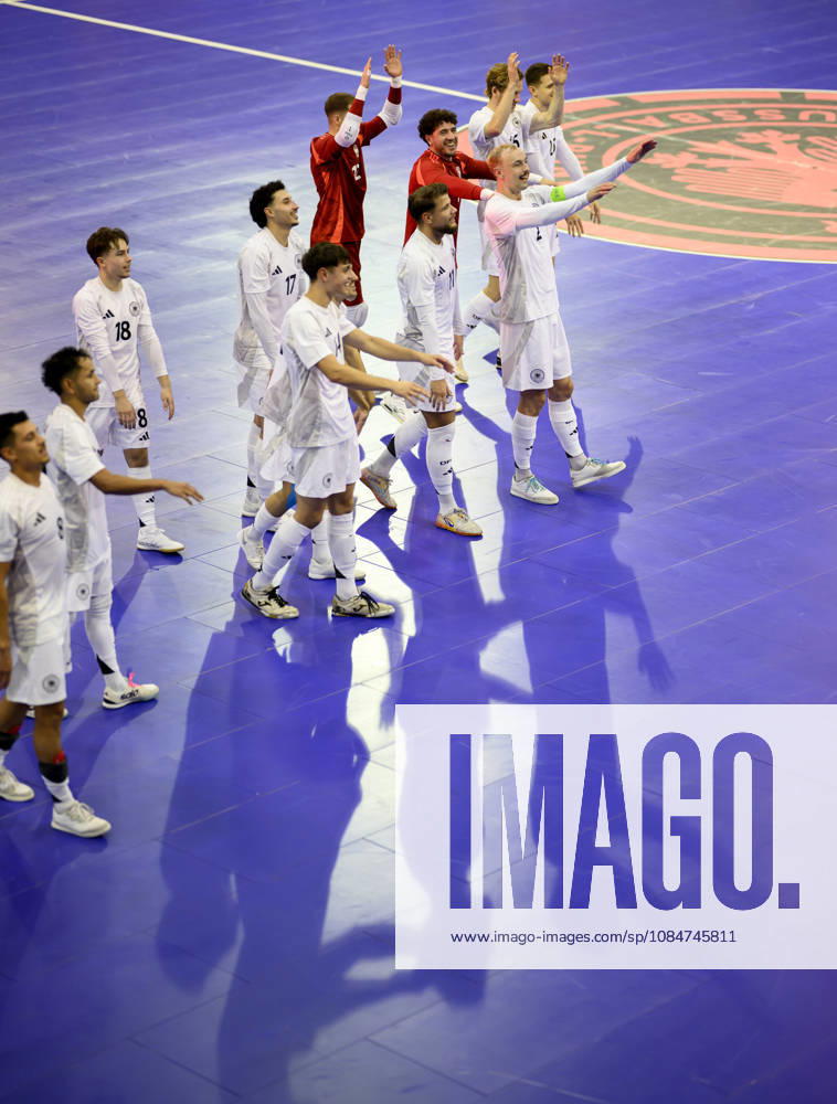 Team Germany celebrates the final goal; the Mexican wave; from left to right: Christopher Wittig (GER), goalkeeper Pavlos Wiegels (GER), Maximilian Grünberg GER, Kim Herterich GER, Theodoros Xydias GER—Futsal World Cup Qualifier: Germany vs. Lithuania, 4–2, on October 18, 2026, in Mülheim an der Ruhr, Germany, at the Westenergie Sporthalle