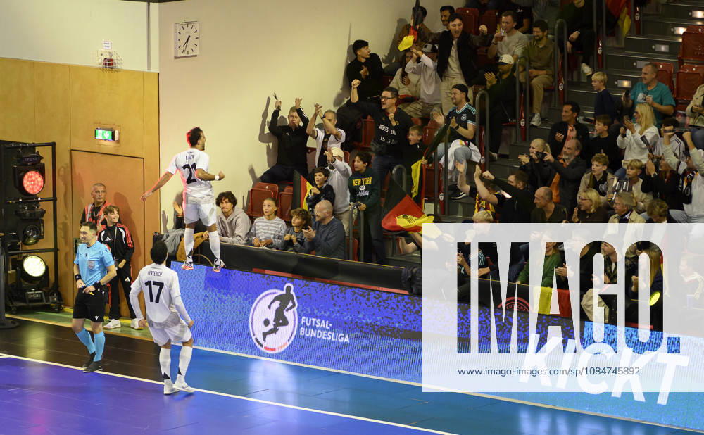 Matias Block (GER) celebrates after scoring the goal that made it 4–2, jumping onto the boards in front of the fans. Futsal World Cup Qualifier: Germany vs. Lithuania, 4–2, on October 18, 2026, in Mülheim an der Ruhr, Germany, at the Westenergie Sporthalle.