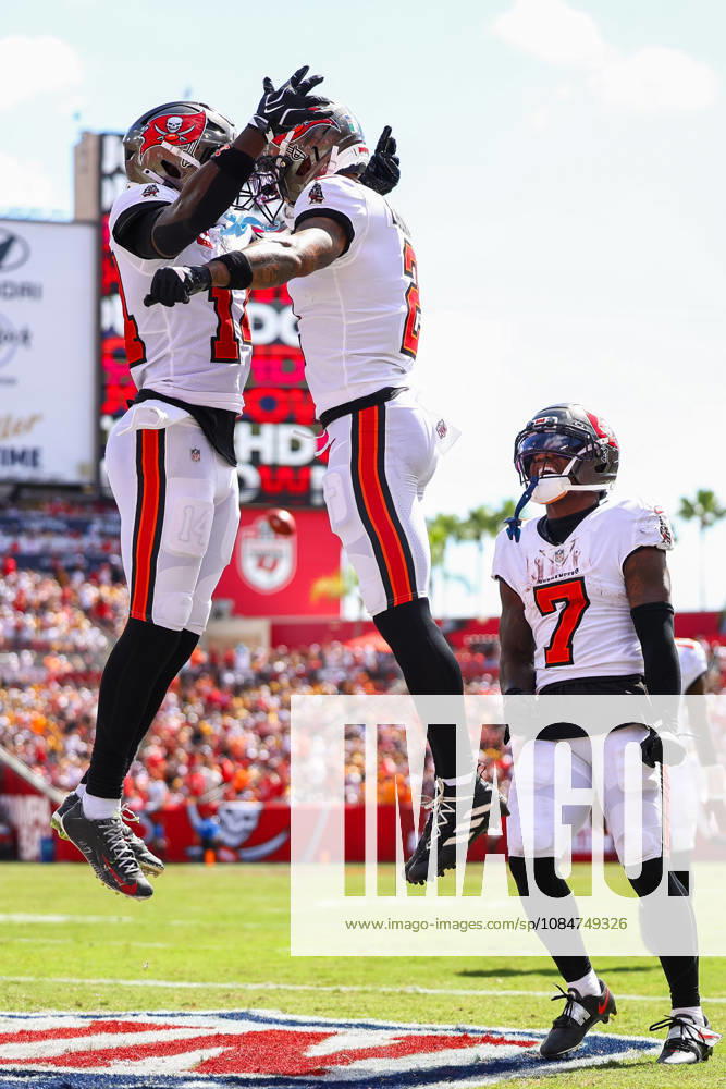 Tampa Bay Buccaneers wide receiver EMEKA EGBUKA (2), Tampa Bay Buccaneers wide receiver CHRIS GODWIN JR. (14), and Tampa Bay Buccaneers running back BUCKY IRVING (7) celebrate a touchdownduring an NFL, American Football Herren, USA football game between the Pittsburgh Steelers and the Tampa Bay Buccaneers on Sunday, October 18, 2026, at Raymond James Stadium in Tampa, Florida. NFL 2026: Pittsburgh Steelers 26:19 Tampa Bay Buccaneers - ZUMAs335 20261018_znp_s335_003