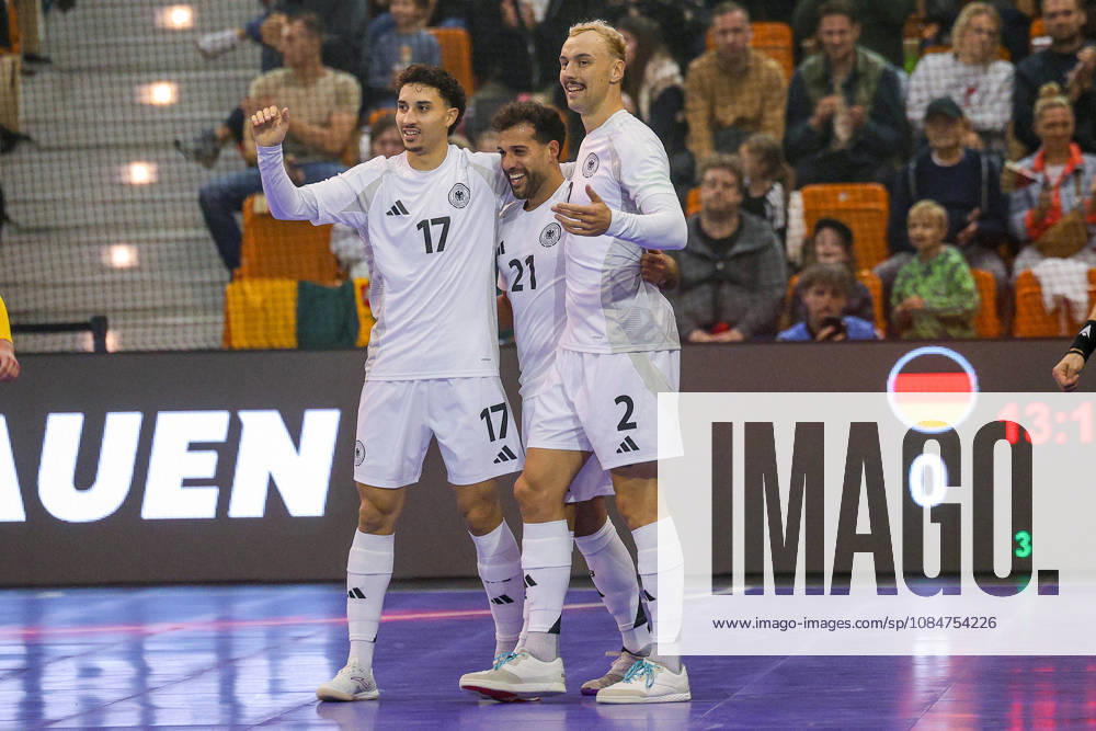 Futsal, World Cup Qualifiers, Germany vs. Lithuania, Westenergie Sports Hall, Mülheim an der Ruhr, 2026–2027 Season: Celebrations after the 1–0 goal scored by Matias Block (Germany 21), along with Kim Herterich (Germany 17) and Christopher Wittig (Germany 02). DFB regulations prohibit any use of photographs as image sequences and or quasi-video. North Rhine-Westphalia, Germany
