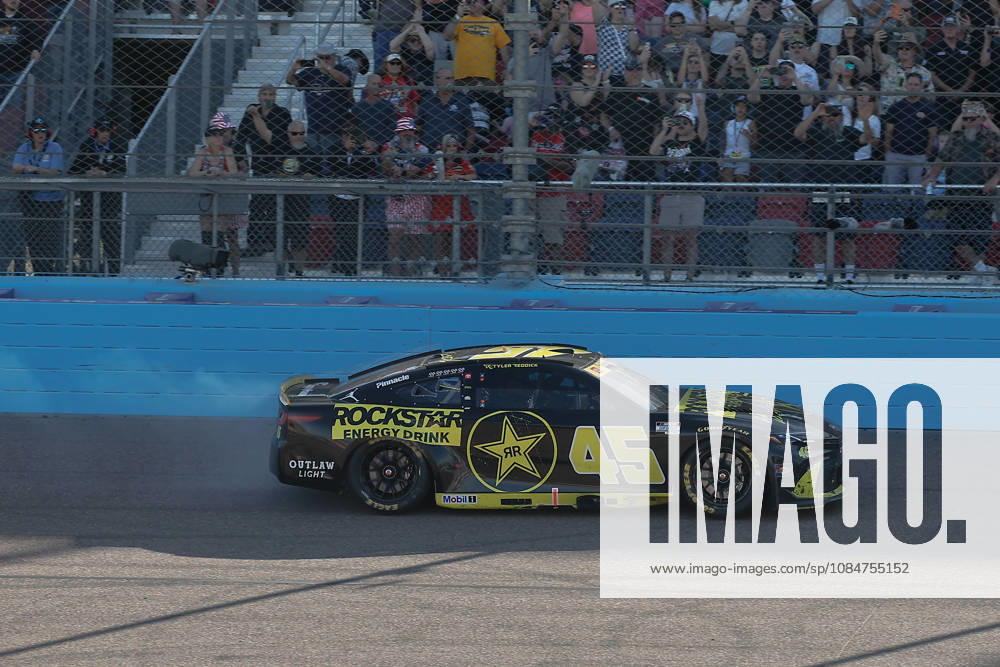 AVONDALE, AZ - OCTOBER 18: Tyler Reddick ( 45 23XI Racing ROCKSTAR ENERGY DRINK Toyota) burns out after winning the NASCAR, Motorsport, USA Cup Series Playoffs Freeway Insurance 500 on October 18, 2026, at Phoenix Raceway in Avondale, AZ. (Photo by Kevin Abele Icon Sportswire) AUTO: OCT 18 NASCAR Cup Series Playoffs Freeway Insurance 500 Icon261018003500
