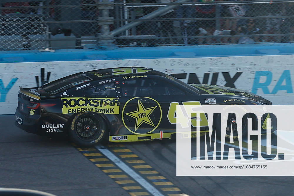 AVONDALE, AZ - OCTOBER 18: Tyler Reddick ( 45 23XI Racing ROCKSTAR ENERGY DRINK Toyota) burns out after winning the NASCAR, Motorsport, USA Cup Series Playoffs Freeway Insurance 500 on October 18, 2026, at Phoenix Raceway in Avondale, AZ. (Photo by Kevin Abele Icon Sportswire) AUTO: OCT 18 NASCAR Cup Series Playoffs Freeway Insurance 500 Icon261018004500