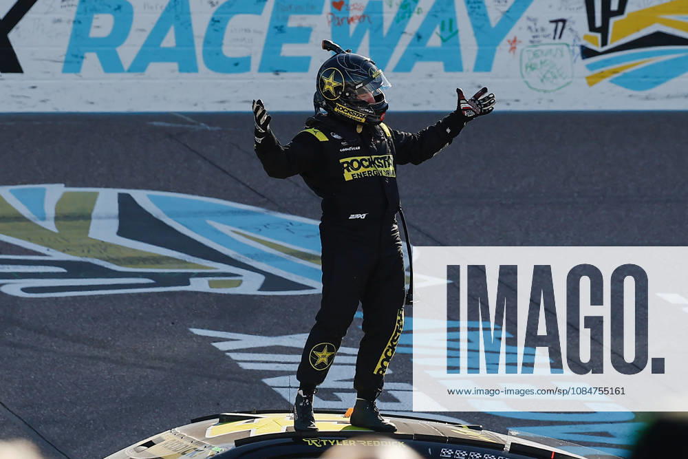 AVONDALE, AZ - OCTOBER 18: Tyler Reddick ( 45 23XI Racing ROCKSTAR ENERGY DRINK Toyota) celebrates with his team after winning the NASCAR, Motorsport, USA Cup Series Playoffs Freeway Insurance 500 on October 18, 2026, at Phoenix Raceway in Avondale, AZ. (Photo by Kevin Abele Icon Sportswire) AUTO: OCT 18 NASCAR Cup Series Playoffs Freeway Insurance 500 Icon261018006500