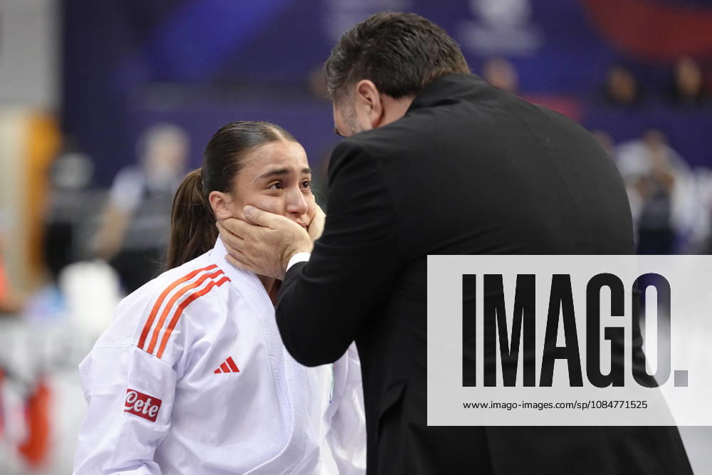 2026 World Cadet, Junior & U21, U 21 Karate Championships BIELSKO-BIALA, POLAND - OCTOBER 17: Ilaria Bianco of Italy celebrates with a coach after winning the junior female kumite -53kg bronze-medal bout at the 2026 World Cadet, Junior & U21 Karate Championships at Hala Pod Debowcem on October 17, 2026 in Bielsko-Biala, Poland. Bielsko-Biala Hala Pod Debowcem Poland