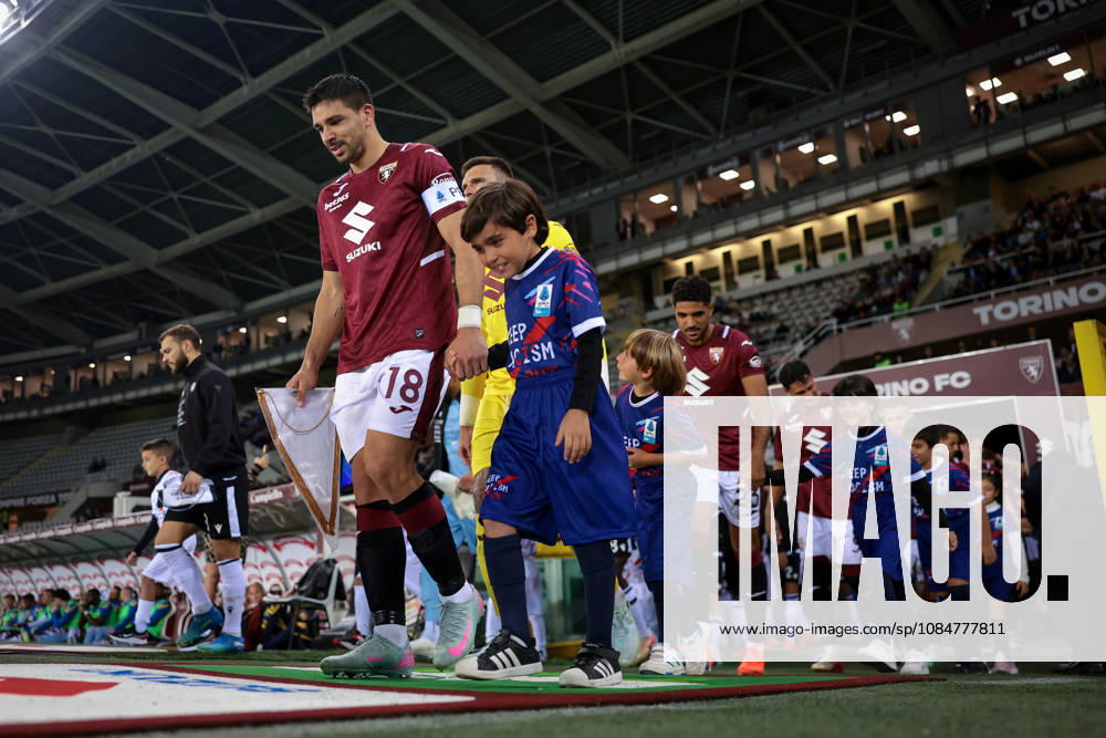 Torino FC v Udinese Calcio - Serie A - Season 2026-2027 Turin, Italy, 12th October 2026. Giovanni Simeone of Torino FC leads out team mates along with mascots prior to the Torino FC vs Udinese Calcio Serie A match at Stadio Grande Torino, Turin. Picture credit should read: Jonathan Moscrop Turin Stadio Olimpico Grande Torino Italy