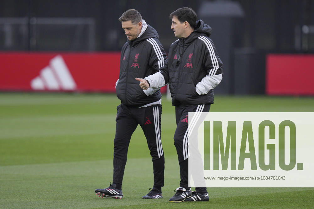 Liverpool Training, Champions League Liverpool FC manager Andoni Iraola speaks with one of his coaches as they walk out to the pitches during the Liverpool Training Session ahead of the UEFA Champions League Matchday 3 v Villarreal CF, AXA Training Centre, Liverpool, United Kingdom on 19 October 2026 Credit: Steve Flynn Every Second Media Editorial use only. All images are copyright Every Second Media Limited. No images may be reproduced without prior permission.
