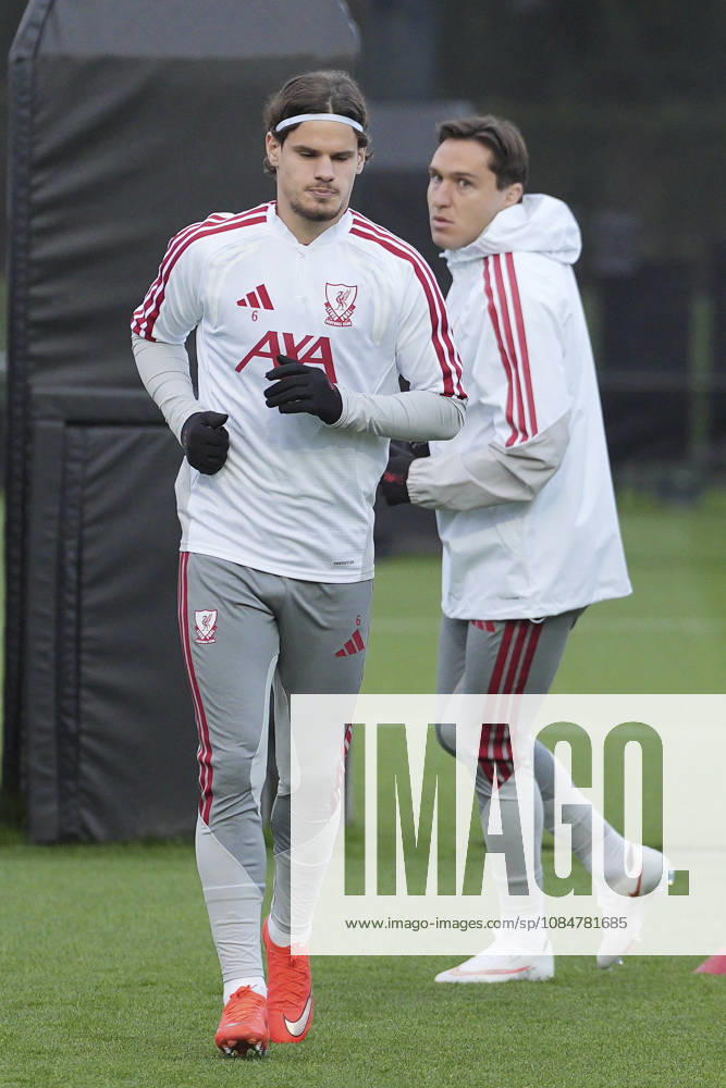 Liverpool Training, Champions League Milos Kerkez of Liverpool FC and Federico Chiesa of Liverpool FC warm up during the Liverpool Training Session ahead of the UEFA Champions League Matchday 3 v Villarreal CF, AXA Training Centre, Liverpool, United Kingdom on 19 October 2026 Credit: Steve Flynn Every Second Media Editorial use only. All images are copyright Every Second Media Limited. No images may be reproduced without prior permission.