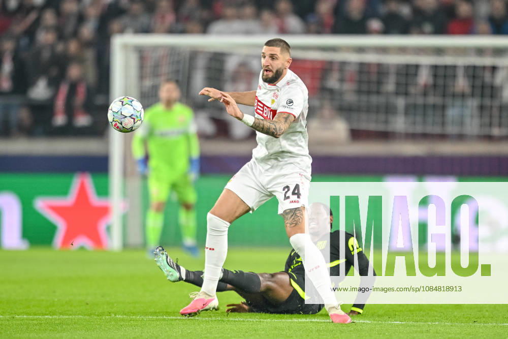 Jeff Chabot of VfB Stuttgart and Jonathan David of Atlético Madrid battle for the ball during the 2026–2027 UEFA Champions League match between Stuttgart and Atlético de Madrid at Arena Stuttgart on October 20, 2026, in Stuttgart, Germany. Photo by Harry Langer, DeFodi Images