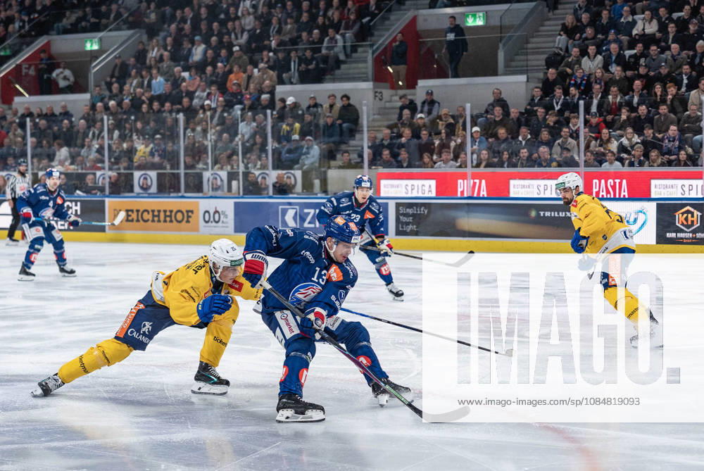 Zurich, Swiss Life Arena, National League: ZSC Lions vs. HC Davos, 25 Beni Waidacher (Davos), 13 Justin Sigrist (ZSC Zurich), Swiss Life Arena, Zurich, Switzerland