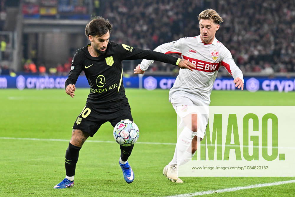 STUTTGART, GERMANY; 20. OCTOBER: tackle between Alex BAENA (Atletico Madrid 10) and Angelo STILLER (VfB Stuttgart 6) during the UEFA Champions League Match between VfB Stuttgart vs. Atletico Madrid at Matchday 3 at MHP Arena