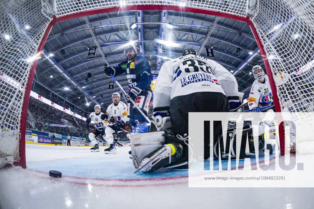 QUINTO, SWITZERLAND OCTOBER 20 Inti Pestoni of Ambri scores against goalkeeper Ludovic Waeber of Fribourg during the game between HC Ambri Piotta and Fribourg Gottéron at the Gottardo Arena on October 20, 2026, in Quinto, Switzerland. Quinto, Ticino, Switzerland