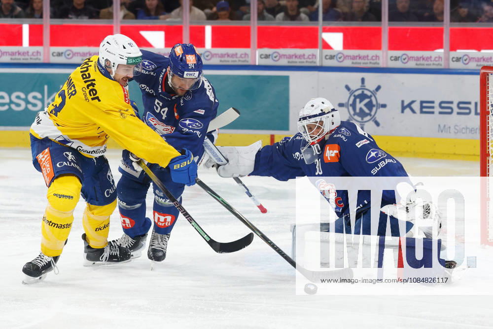 Swiss Life Arena, Zurich, SWITZERLAND, 2026–2027 Season, Men s Ice Hockey National League, ZSC Lions vs. HC Davos: Yannick Frehner (left), HC Davos, against Christian Marti (ZSC), in front of ZSC goaltender Simon Hrubec