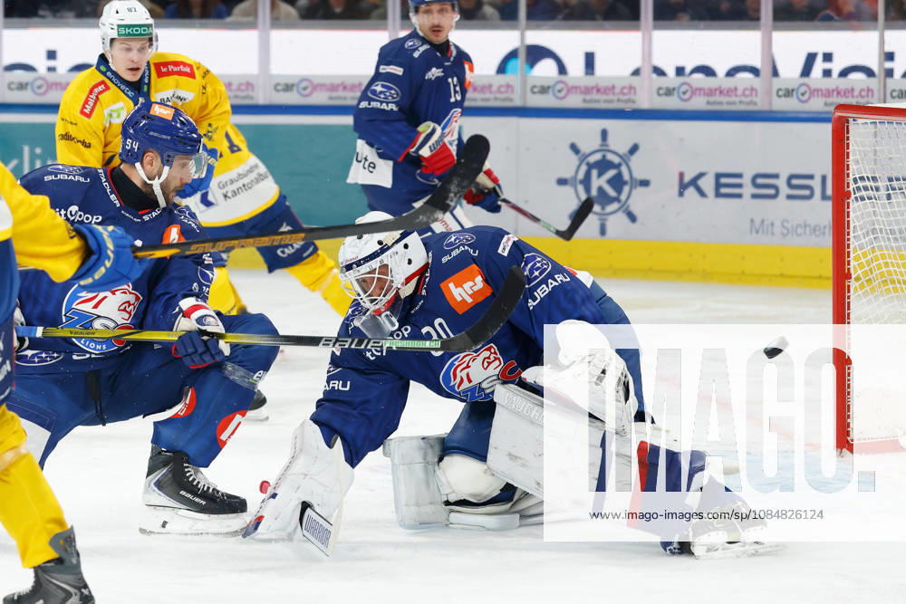 Swiss Life Arena, Zurich, SWITZERLAND, 2026–2027 Season, Men s Ice Hockey National League: ZSC Lions vs. HC Davos; Christian Marti (ZSC) and goaltender Simon Hrubec (ZSC) defend