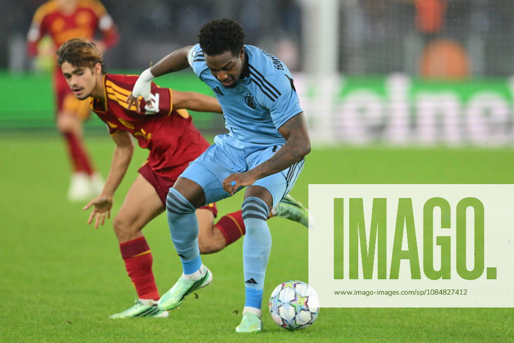 IPA89965259 - Sandro Cruz of Slovan Bratislava under pressure from Rodrigo Mora of Roma during the UEFA Champions League soccer match between Roma and Slovan Bratislava at the Stadio Olimpico on October 20, 2026, in Rome, Lazio. During the AS Roma vs. Slovan Bratislava UEFA Champions League soccer match in Rome, Italy, on October 20, 2026