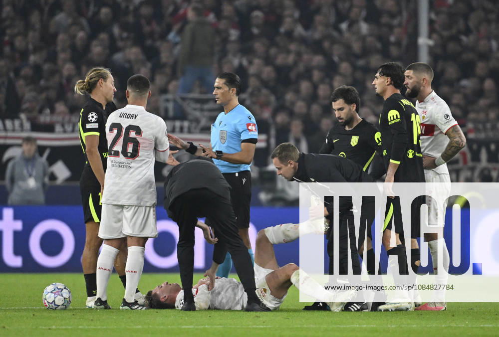 Angelo Stiller, VfB Stuttgart 06, injured; lying on the ground; referee Serdar Goezuebueyuek (NED) in discussion with Marcos Llorente, Atlético de Madrid 14; Champions League: VfB Stuttgart vs. Atlético Madrid, October 20, 2026; DFL REGULATIONS PROHIBIT ANY USE OF PHOTOGRAPHS AS IMAGE SEQUENCES AND OR QUASI-VIDEO Champions League VfB Stuttgart vs. Atlético Madrid