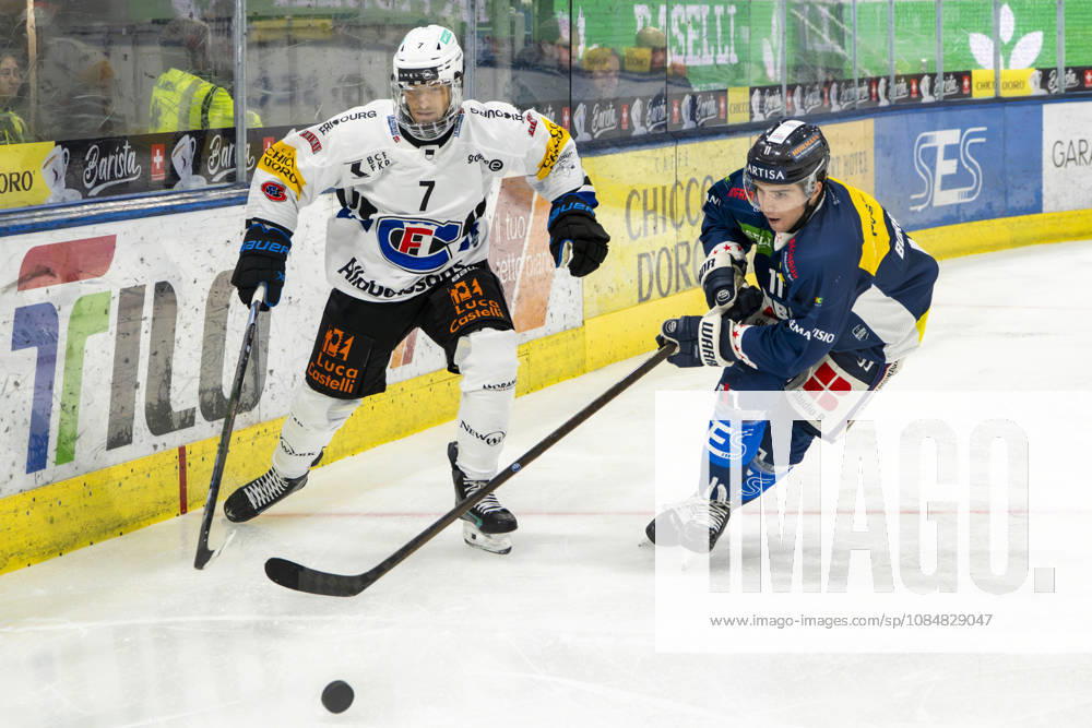 QUINTO, SWITZERLAND, OCTOBER 20—Benoit Jecker of Fribourg (L) faces off against Nathan Borradori of Ambri (R) during the game between HC Ambri Piotta and Fribourg Gottéron at the Gottardo Arena on October 20, 2026, in Quinto, Switzerland. Quinto, Ticino, Switzerland
