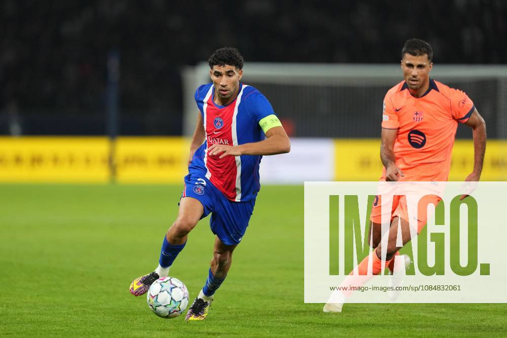 Achraf Hakimi of PSG takes on Rodri of Barcelona Paris Saint-Germain v Barcelona, UEFA Champions League, Football, Parc des Princes, Paris, France - 20 Oct 2026Paris Parc des Princes France