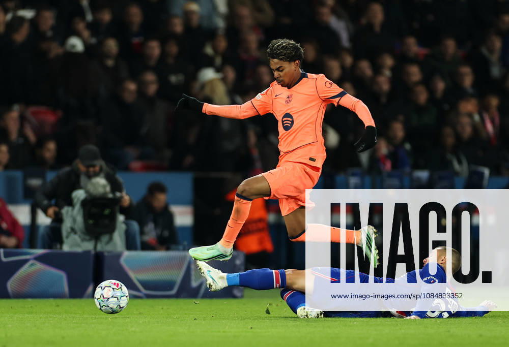 (261021) -- PARIS, Oct. 21, 2026 -- Barcelona s Lamine Yamal (top) competes during the UEFA Champion s League football match between Paris Saint Germain and Barcelona, Paris, France, Oct. 20, 2026. ) (SP) FRANCE-PARIS-FOOTBALL-UEFA CHAMPIONS LEAGUE-PSG VS BARCELONA WuxHuiwo