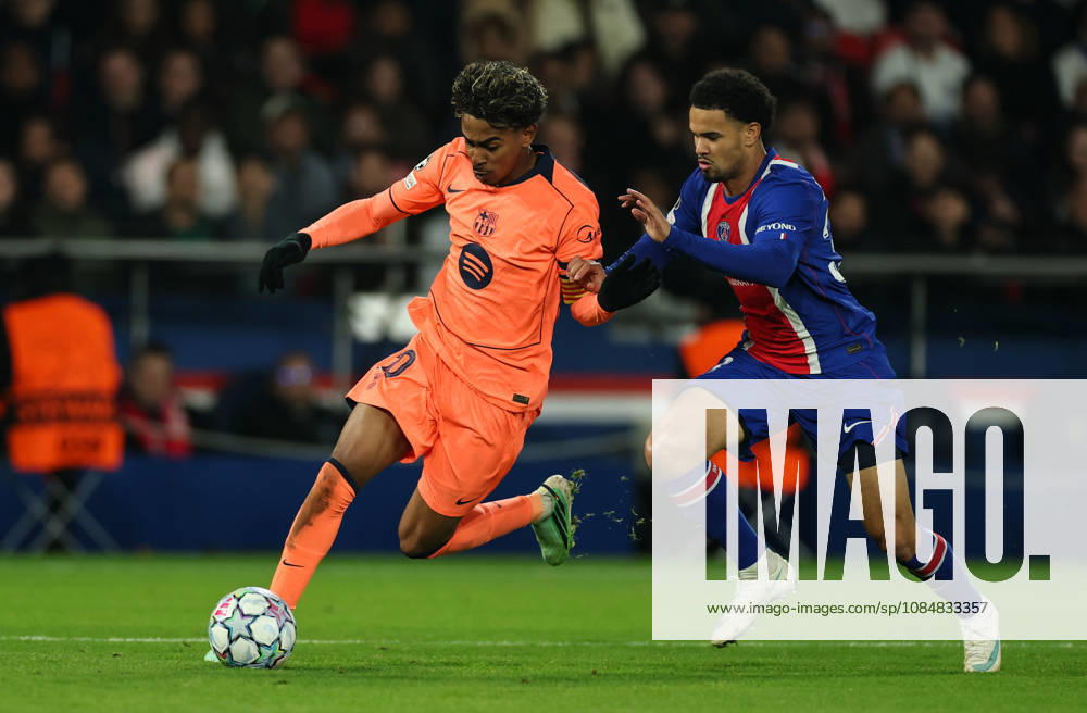(261021) -- PARIS, Oct. 21, 2026 -- Barcelona s Lamine Yamal (L) competes during the UEFA Champion s League football match between Paris Saint Germain and Barcelona, Paris, France, Oct. 20, 2026. ) (SP) FRANCE-PARIS-FOOTBALL-UEFA CHAMPIONS LEAGUE-PSG VS BARCELONA WuxHuiwo